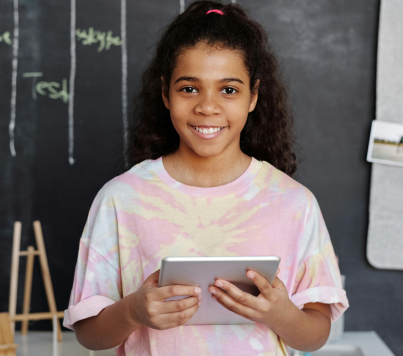 Smiling girl with tablet